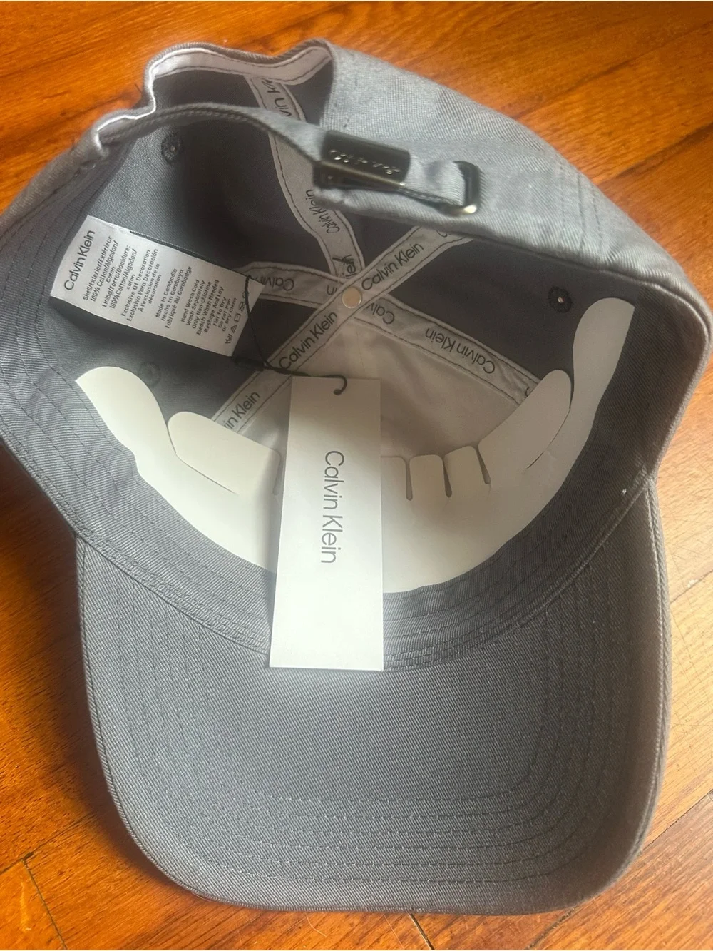 Calvin Klein women baseball cap grey With Blue accents inside logo